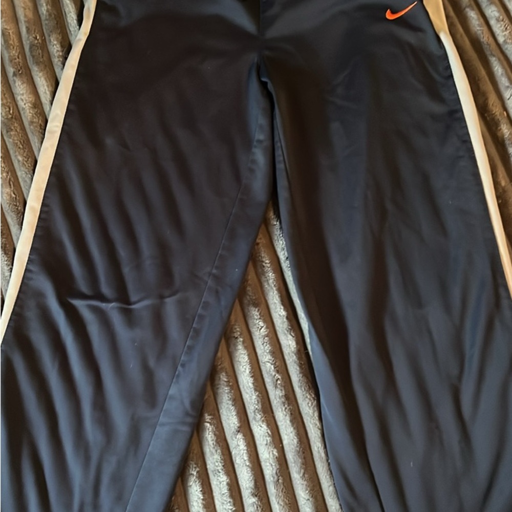 Boys Nike Black Sweatpants with White Side Stripe and Orange Swoosh